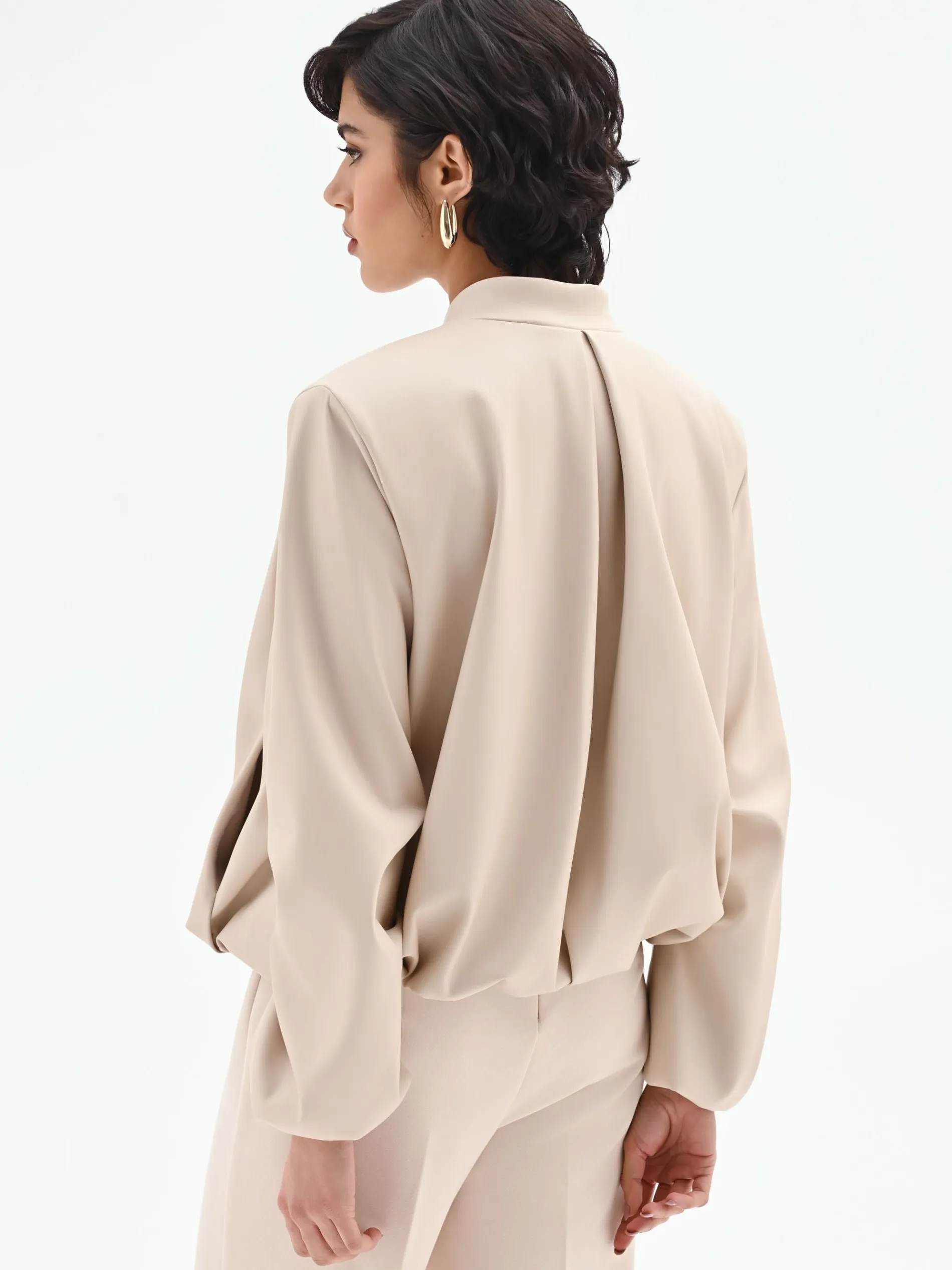 BOMBER IN SIMILPELLE TORTORA BEIGE CON MANICHE A PALLONCINO