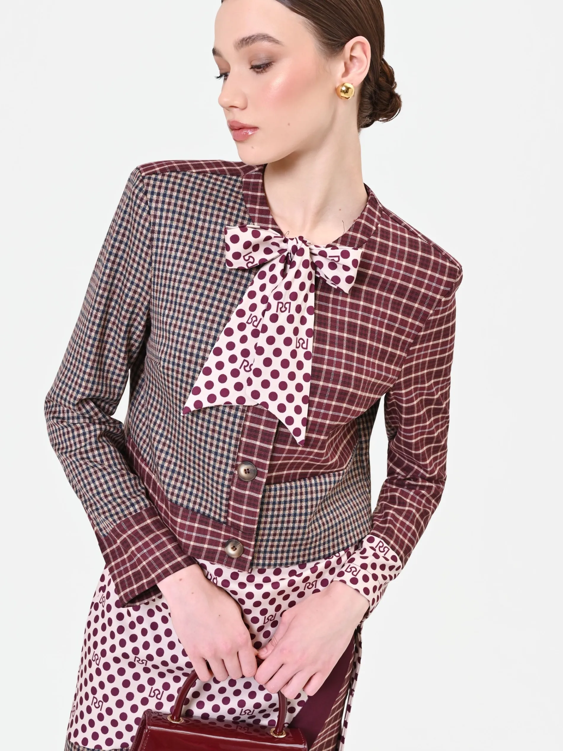 GIACCA ROSSO BORDEAUX CON DESIGN PATCHWORK E FIOCCO