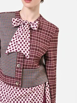 GIACCA ROSSO BORDEAUX CON DESIGN PATCHWORK E FIOCCO