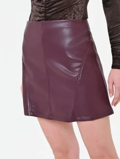 MINIGONNA BORDEAUX EFFETTO PELLE A PANNELLI
