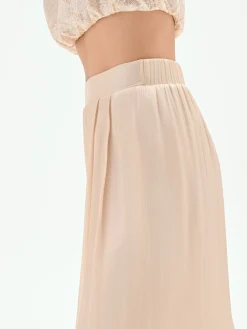 PANTALONE A PALAZZO BEIGE CHIARO IN RASO CANGIANTE