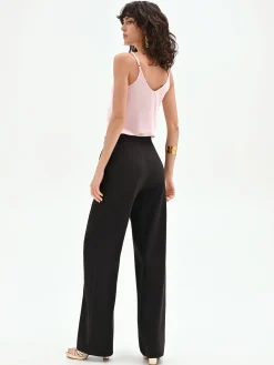 PANTALONE NERO A GAMBA DRITTA CON BOTTONI GIOIELLO