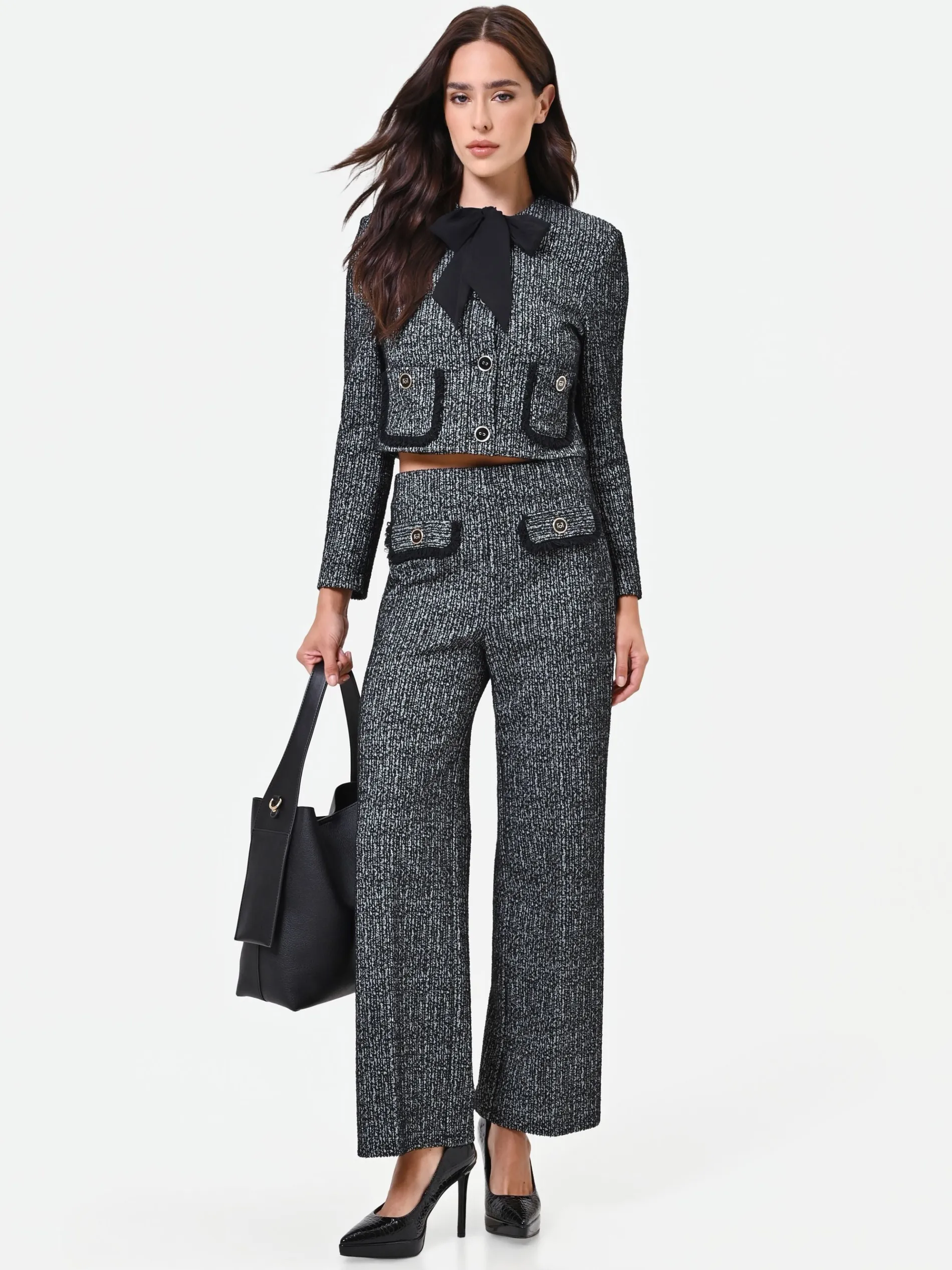 PANTALONE NERO IN BOUCLÉ CON TASCHE A TOPPA