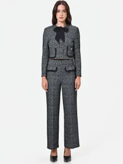 PANTALONE NERO IN BOUCLÉ CON TASCHE A TOPPA