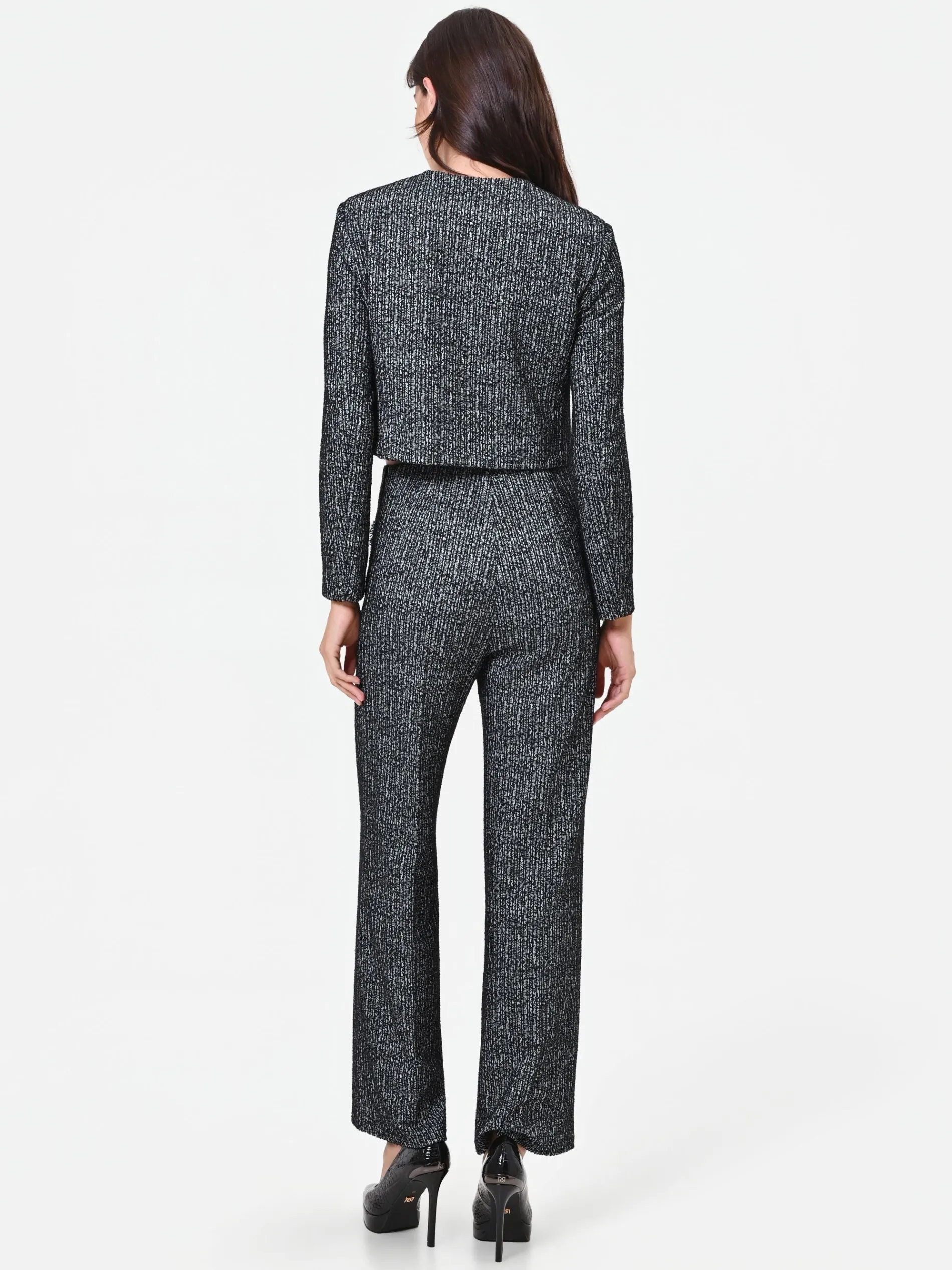 PANTALONE NERO IN BOUCLÉ CON TASCHE A TOPPA