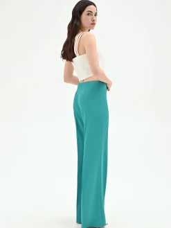 PANTALONE PALAZZO TURCHESE AZZURRO DALLA LINEA FLUIDA