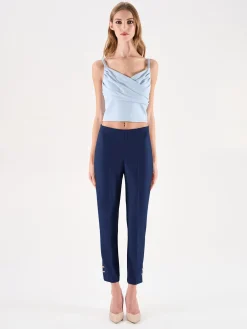 PANTALONI BLU CON BOTTONI DORATI