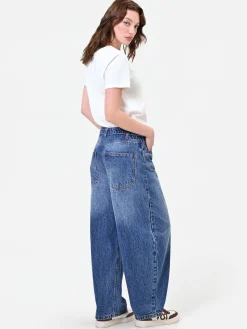 PANTALONI JEANS BLU INDACO CON CHIUSURA ASIMMETRICA