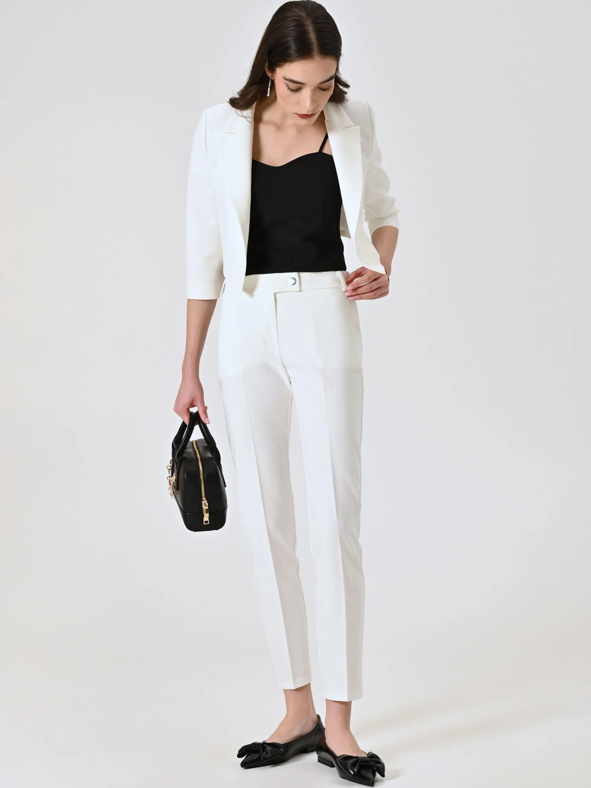 PANTALONI SLIM IN TESSUTO TECNICO BIANCO