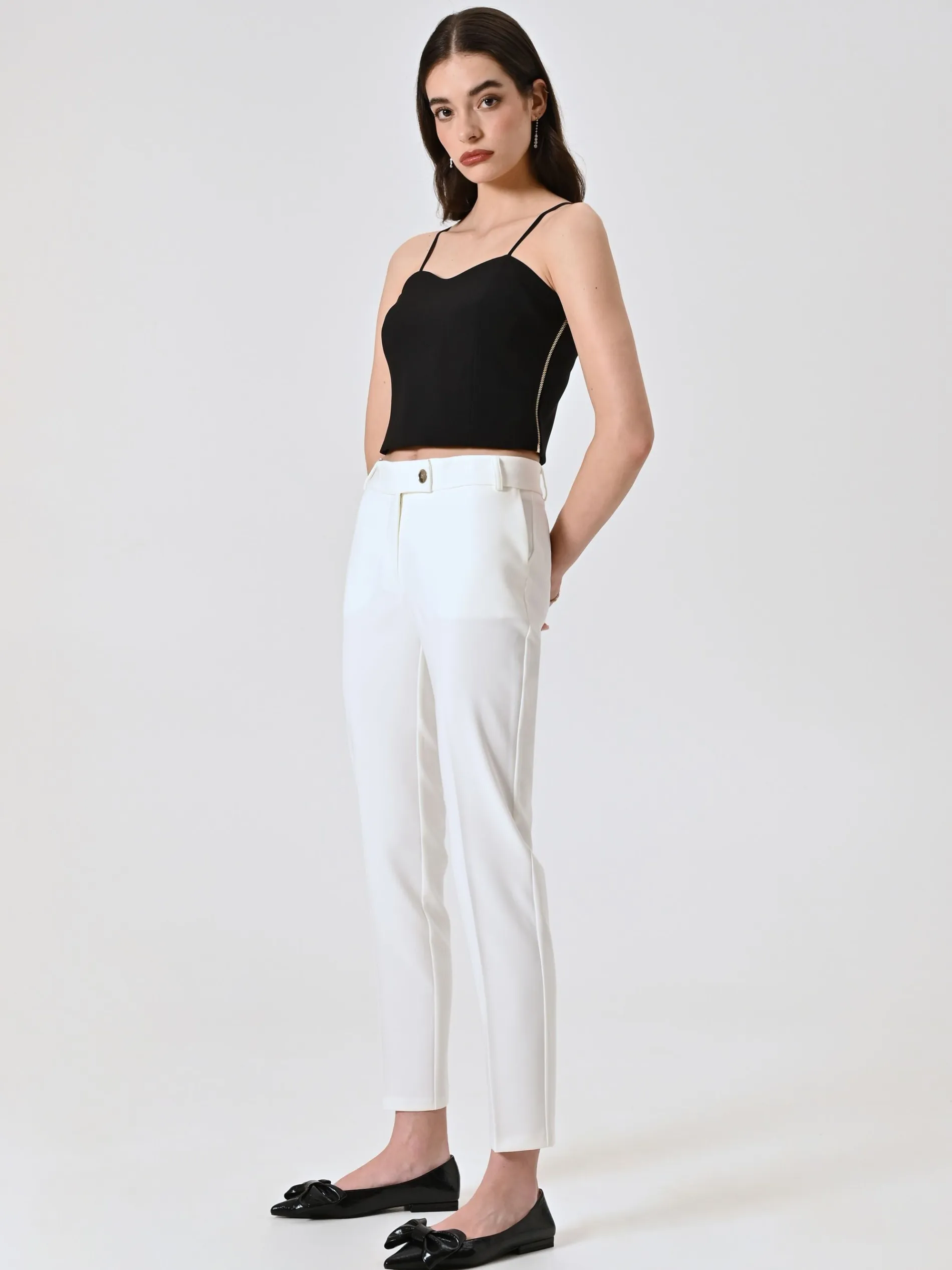 PANTALONI SLIM IN TESSUTO TECNICO BIANCO